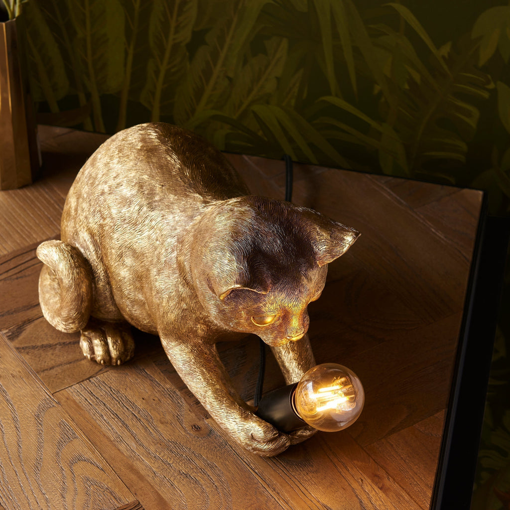 Lámpara de mesa WhiskerGlow con forma de gato, de resina, en dorado antiguo y negro mate