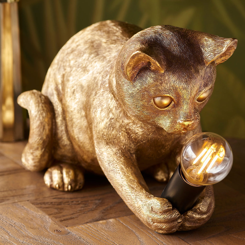 Lámpara de mesa WhiskerGlow con forma de gato, de resina, en dorado antiguo y negro mate