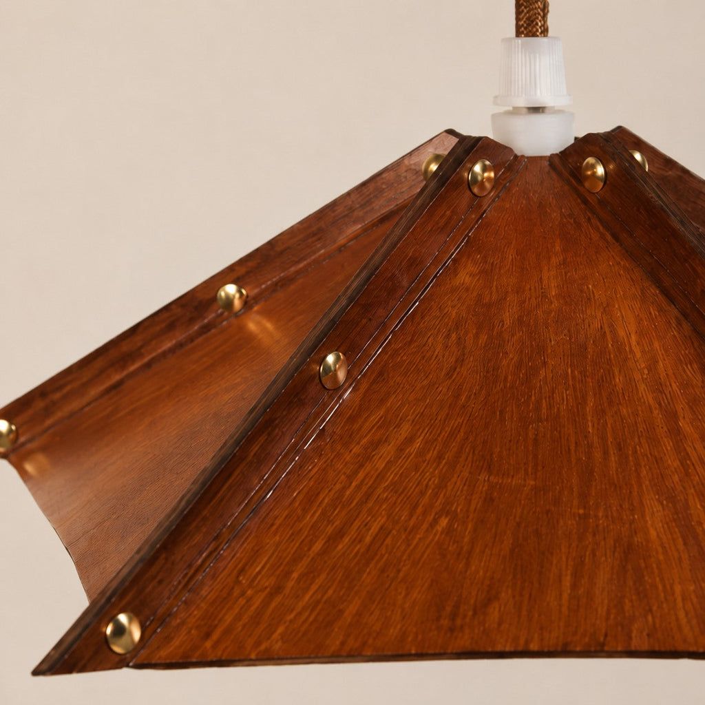 Compact Folded Leather Pendant Lamp, Warm Vintage Glow, Raised Seam Details