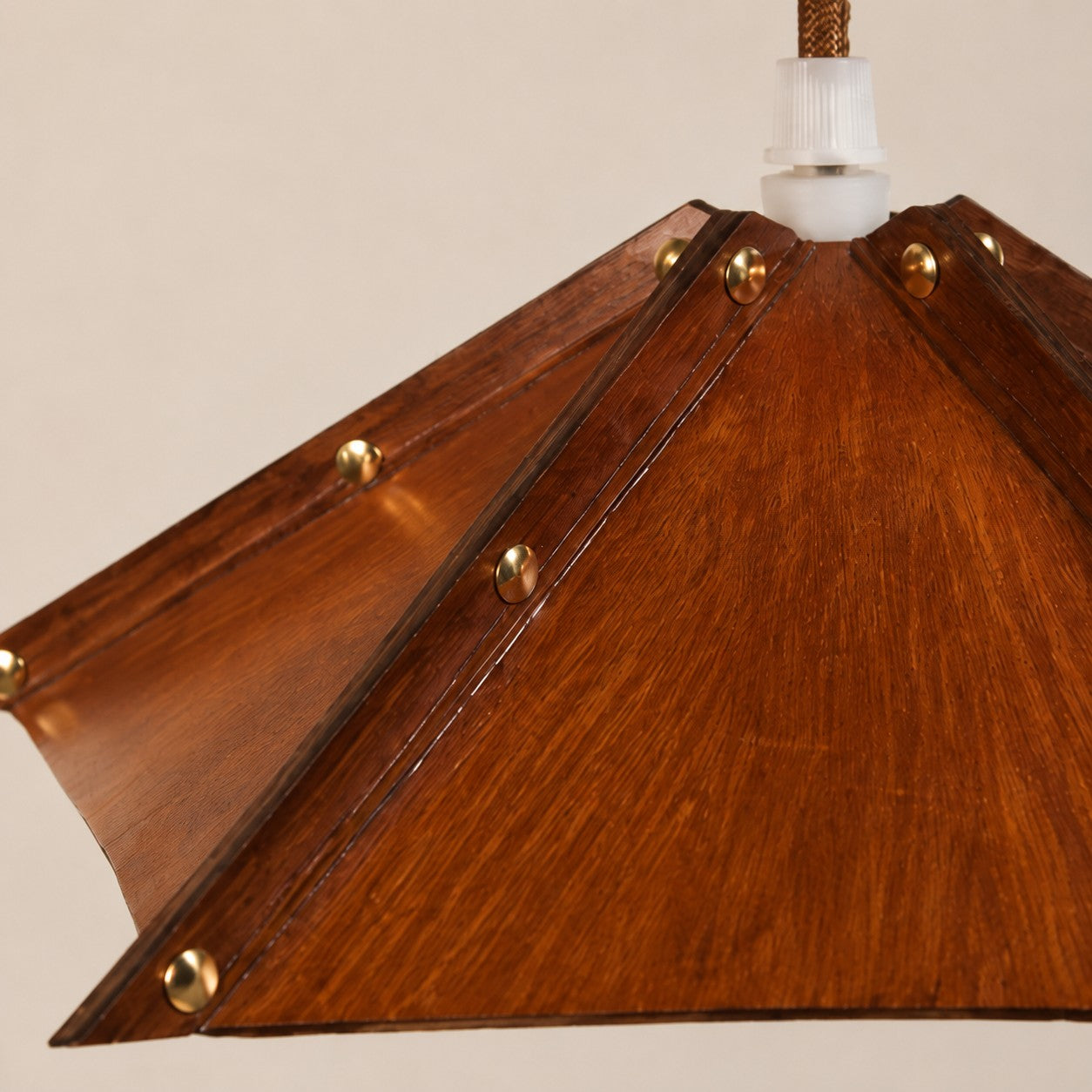 Compact Folded Leather Pendant Lamp, Warm Vintage Glow, Raised Seam Details