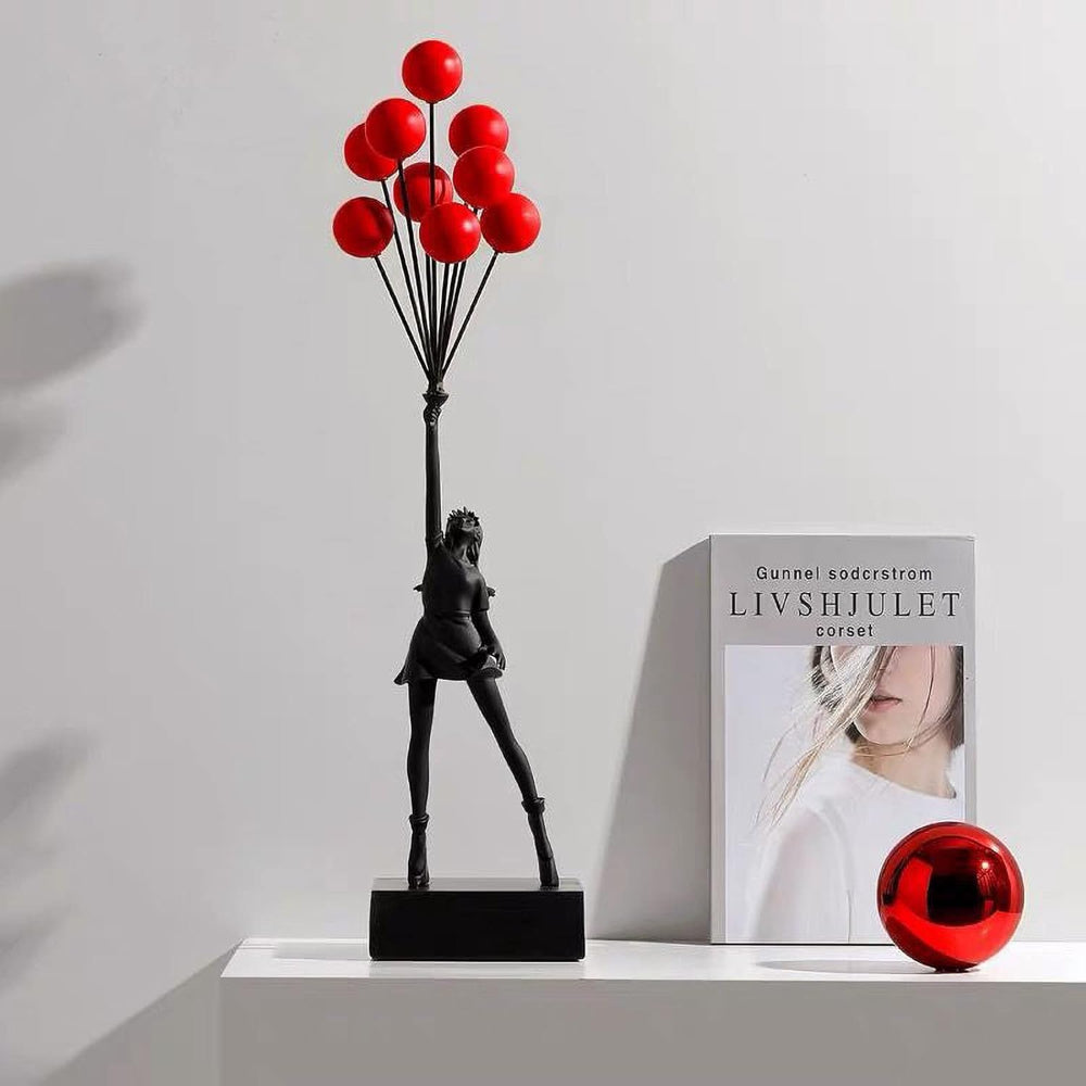 Sculpture moderne d'une fille ballon - figurine artistique minimaliste aux contours travaillés
