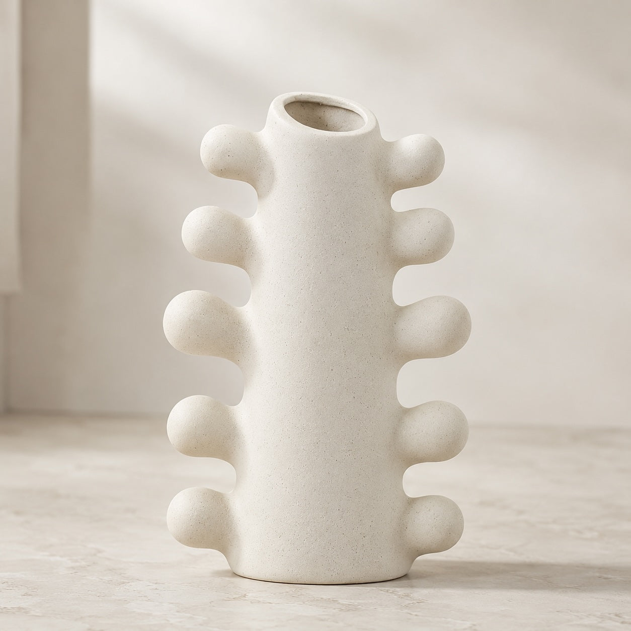 Modern Sculpted Ceramic Vase Cylindrical Base White Ceramic Handcrafted Home Decor | ribuella