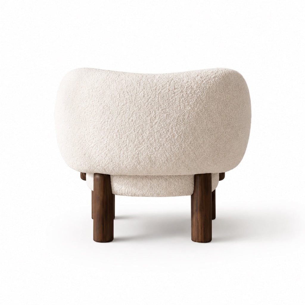 Contemporary Small Armchair with Curved Backrest Solid Wood Base Upholstered Seat Compact Design | ribuella