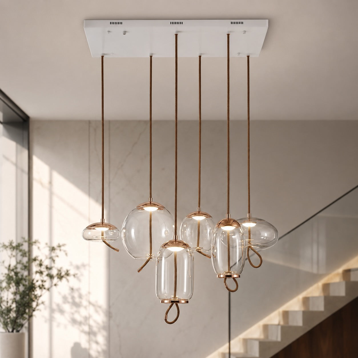 Suspension moderne en verre soufflé, luminaire suspendu avec LED réglable et accent en cuivre rose | ribuella
