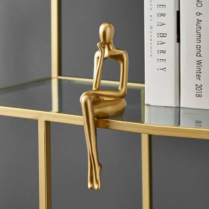 Stylish Abstract Resin Sculpture in Radiant Gold Finish | ribuella