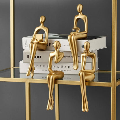 Stylish Abstract Resin Sculpture in Radiant Gold Finish | ribuella