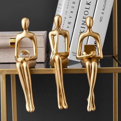 Stylish Abstract Resin Sculpture in Radiant Gold Finish | ribuella