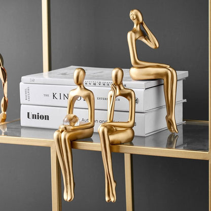 Stylish Abstract Resin Sculpture in Radiant Gold Finish | ribuella