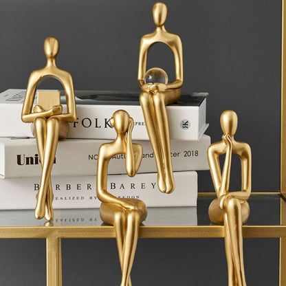 Stylish Abstract Resin Sculpture in Radiant Gold Finish | ribuella