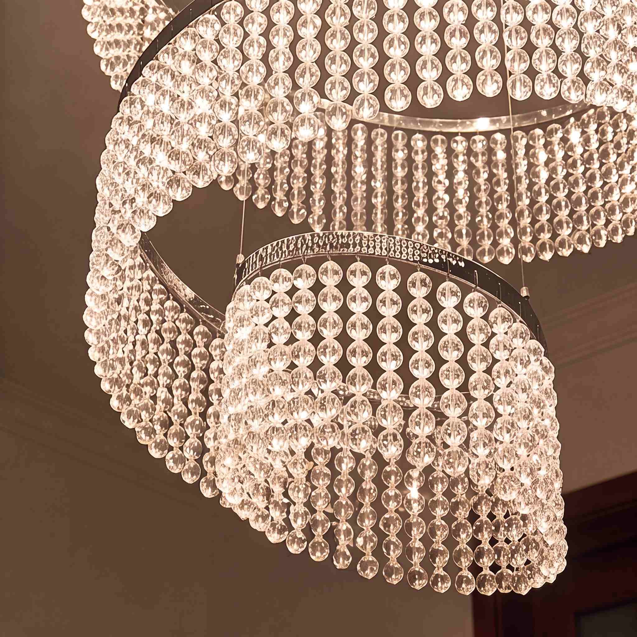 Lustre moderne en cristal à anneaux multiples, luminaire LED suspendu en acier inoxydable réglable | ribuella