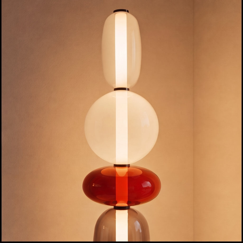 Moderní stojací lampa s nastavitelnou výškou, skleněným LED osvětlením a designem vrstvených oblázků | ribuella