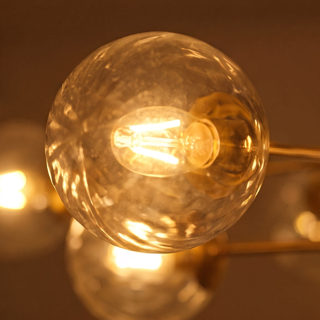 Candelabru modern, etajat, suspendat, cu structură din alamă, globuri din sticlă striată și design cu 12 lumini | ribuella