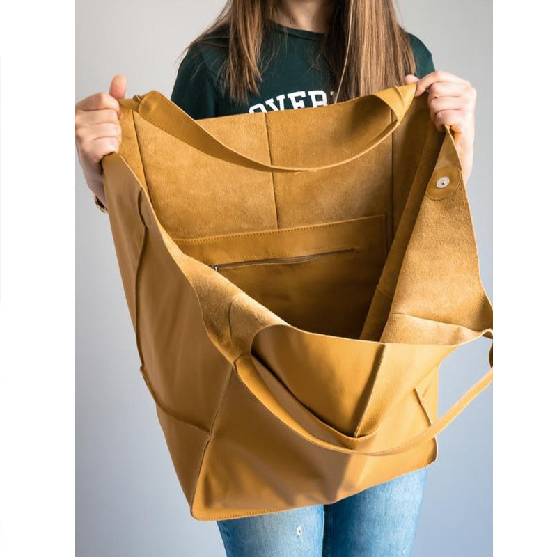 気軽な冒険にぴったりのゆったりサイズのPUレザートラベルトート | ribuella