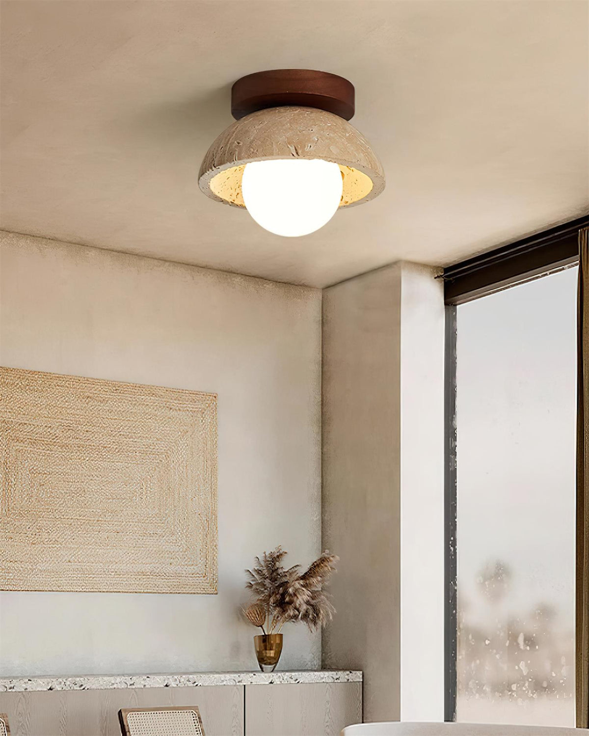 Moderne kompakt loftslampe med raffineret form og blødt varmt skær