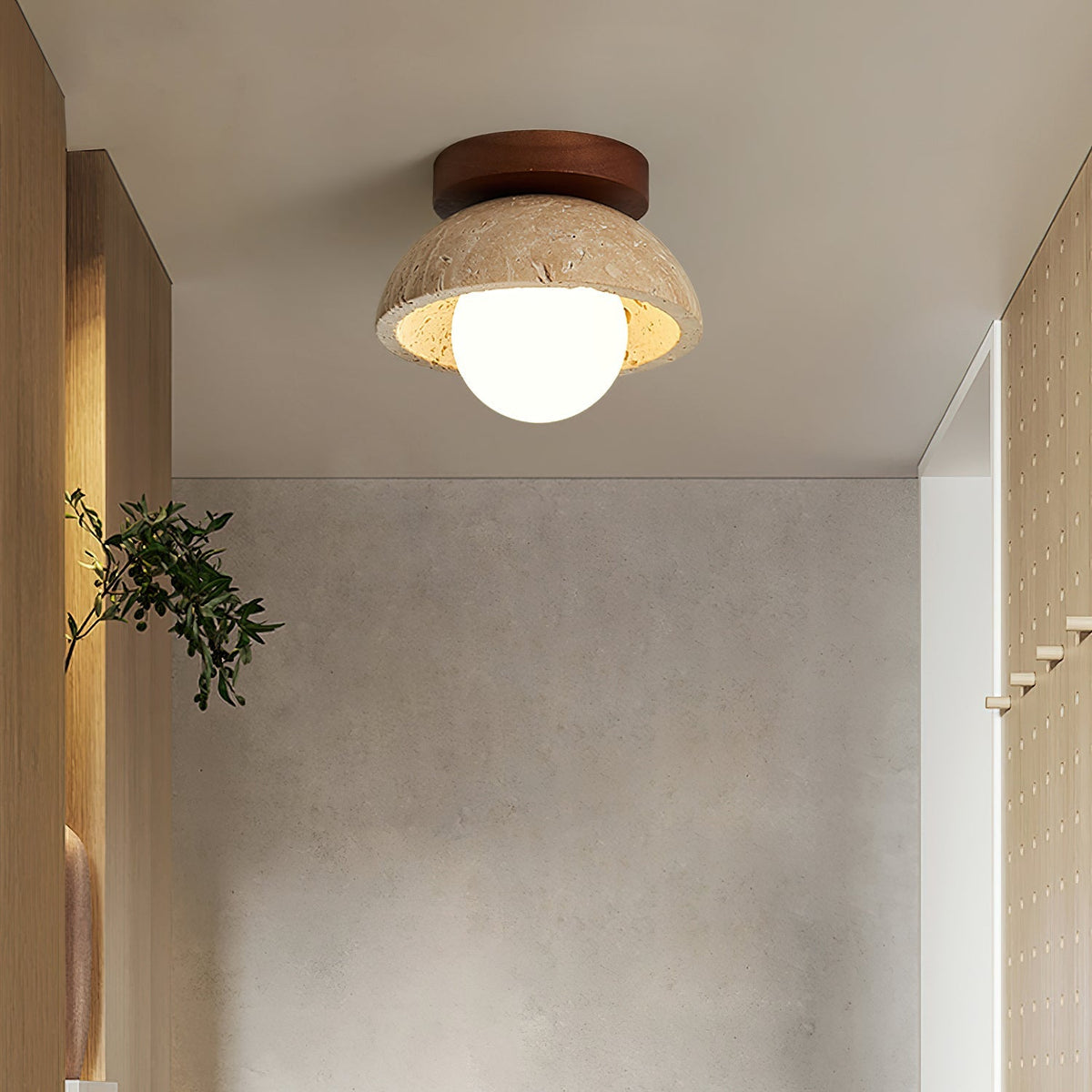 Moderne kompakt loftslampe med raffineret form og blødt varmt skær