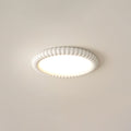 Plafonnier sculptural LumaWave avec motif lumineux ondulé dynamique