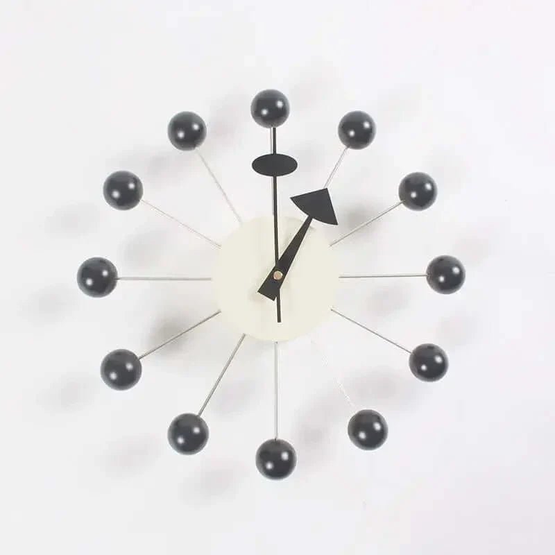 Metallene Wanduhr von Luminara mit Sonnenstrahl-Design, 32 Cm — leises Quarzwerk