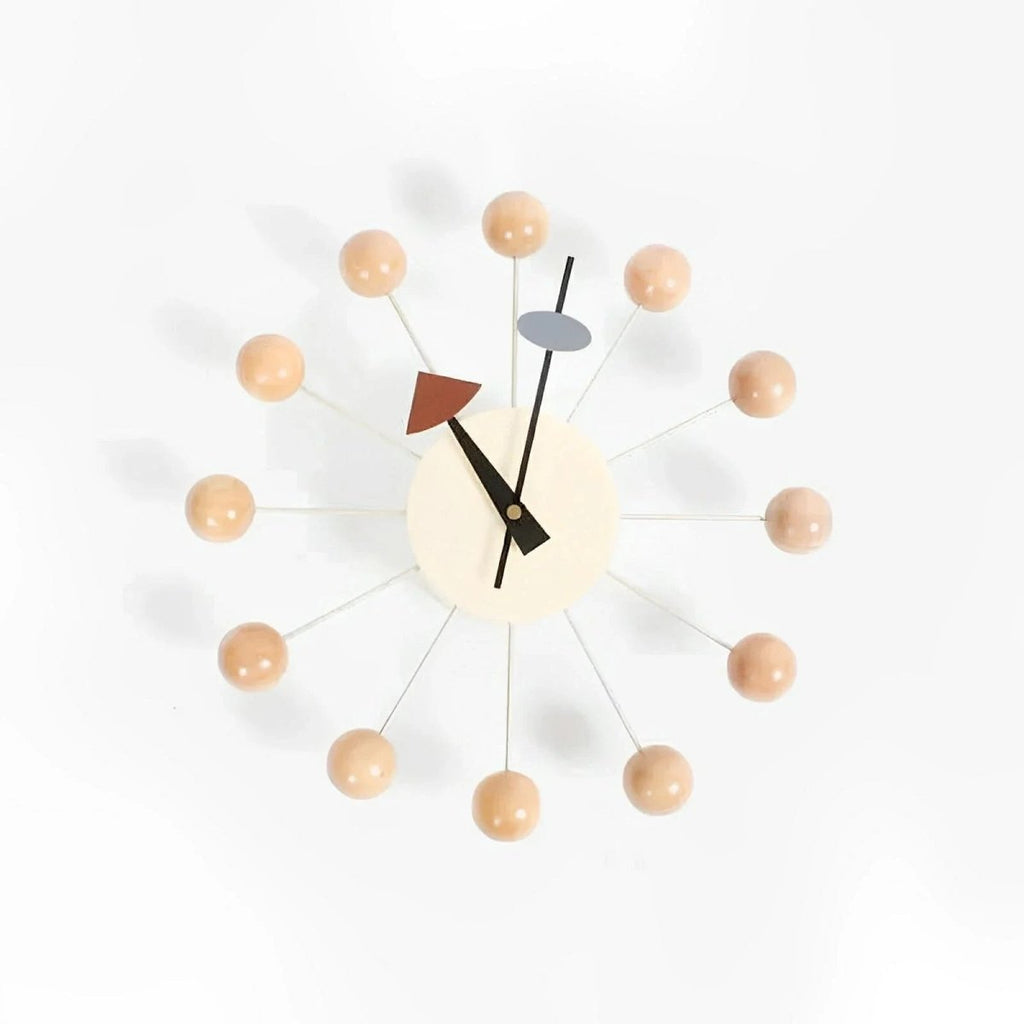 Metallene Wanduhr von Luminara mit Sonnenstrahl-Design, 32 Cm — leises Quarzwerk