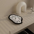 Roman Numeral Wall Clock with a Surreal Design | ribuella