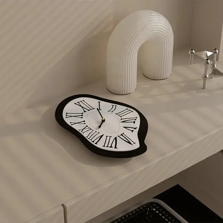 Roman Numeral Wall Clock with a Surreal Design | ribuella