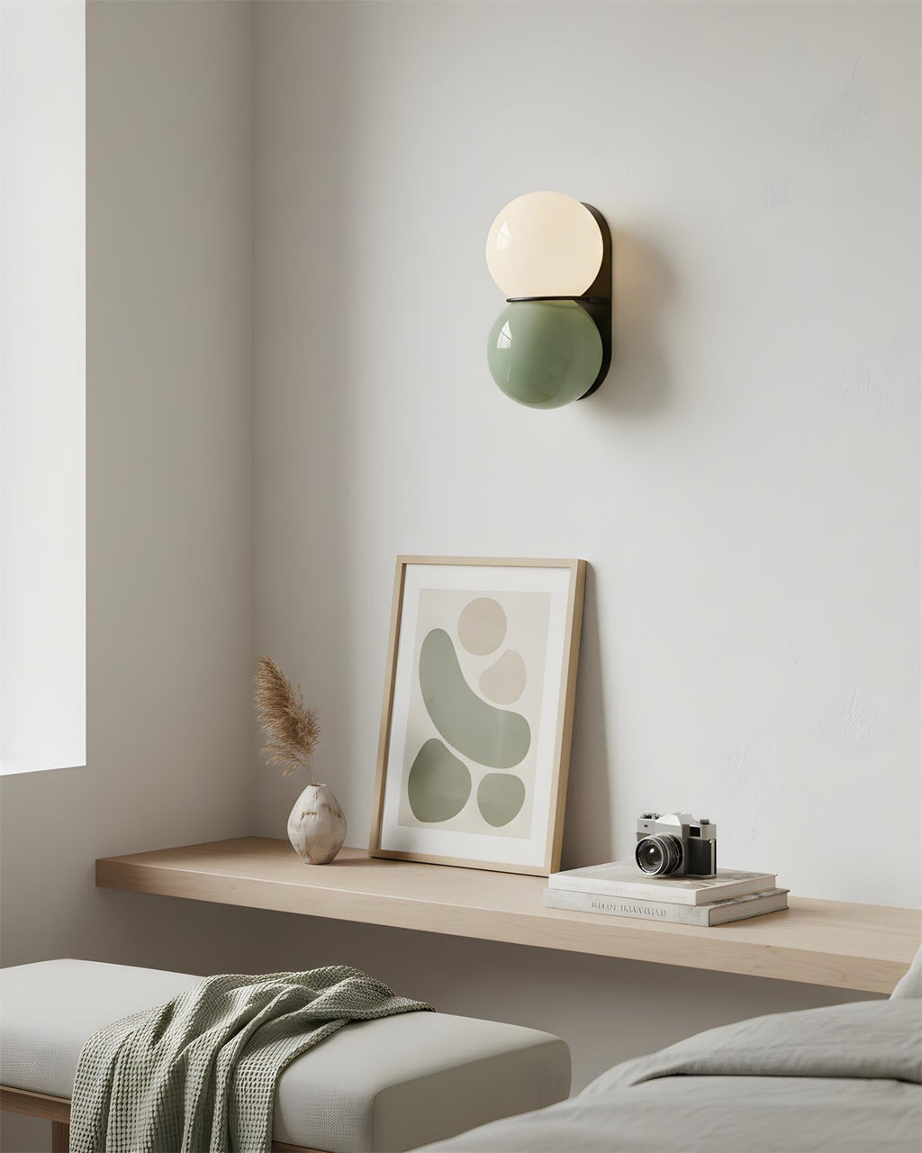 Appliques murales à deux globes, forme sculpturale et finition à dégradé subtil