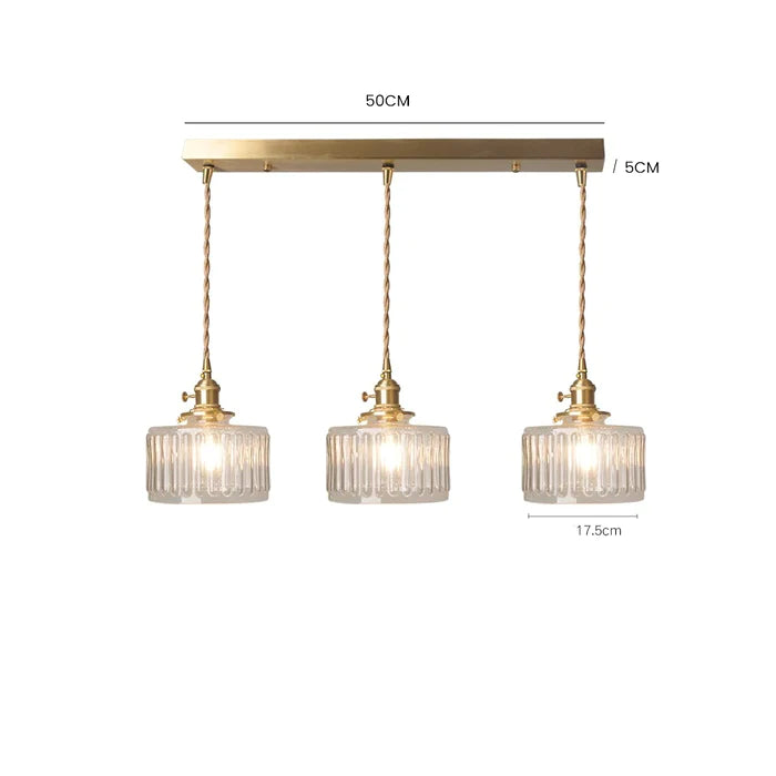 Regulowana lampa wisząca Marcelli z kryształowego szkła, w stylu vintage i cylindrycznym kształcie