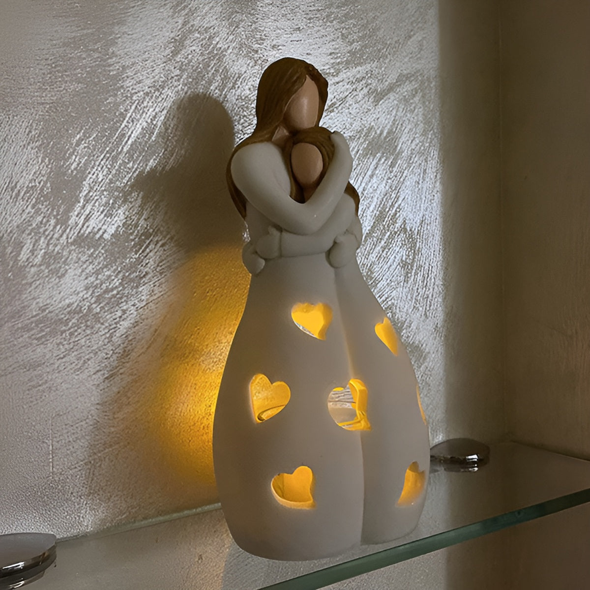 Luz decorativa Embrace Glow - Parpadeo cálido y efecto de sombras suaves