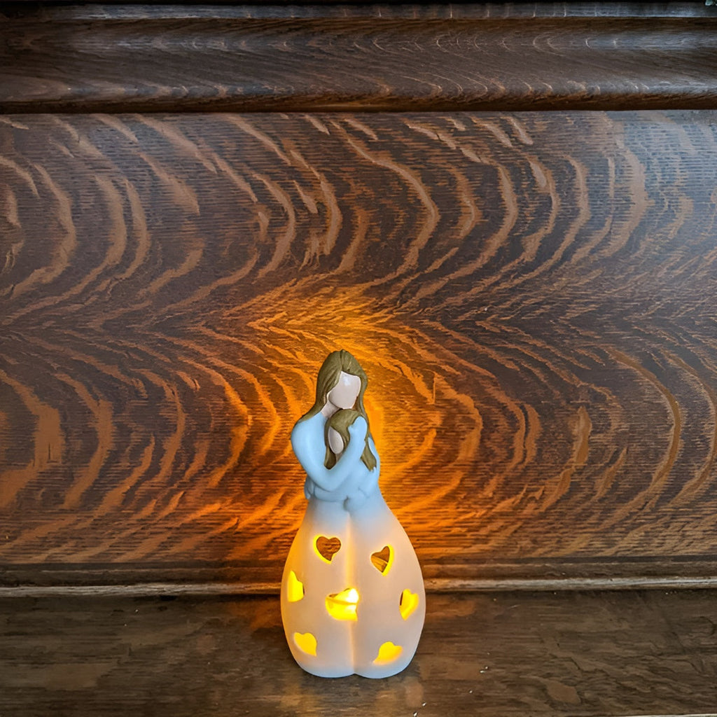 Luz decorativa Embrace Glow - Parpadeo cálido y efecto de sombras suaves