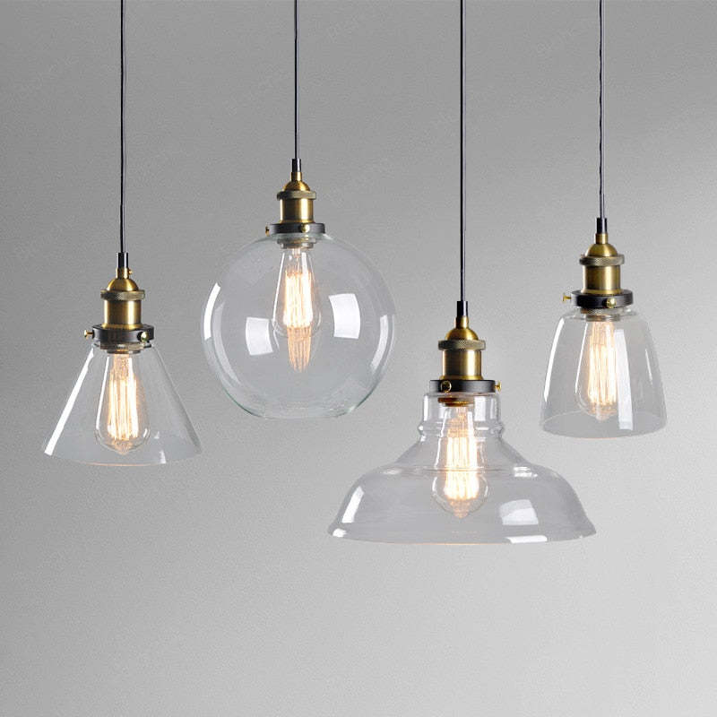 Lampada a sospensione industriale June in vetro trasparente, ambrato o grigio fumo