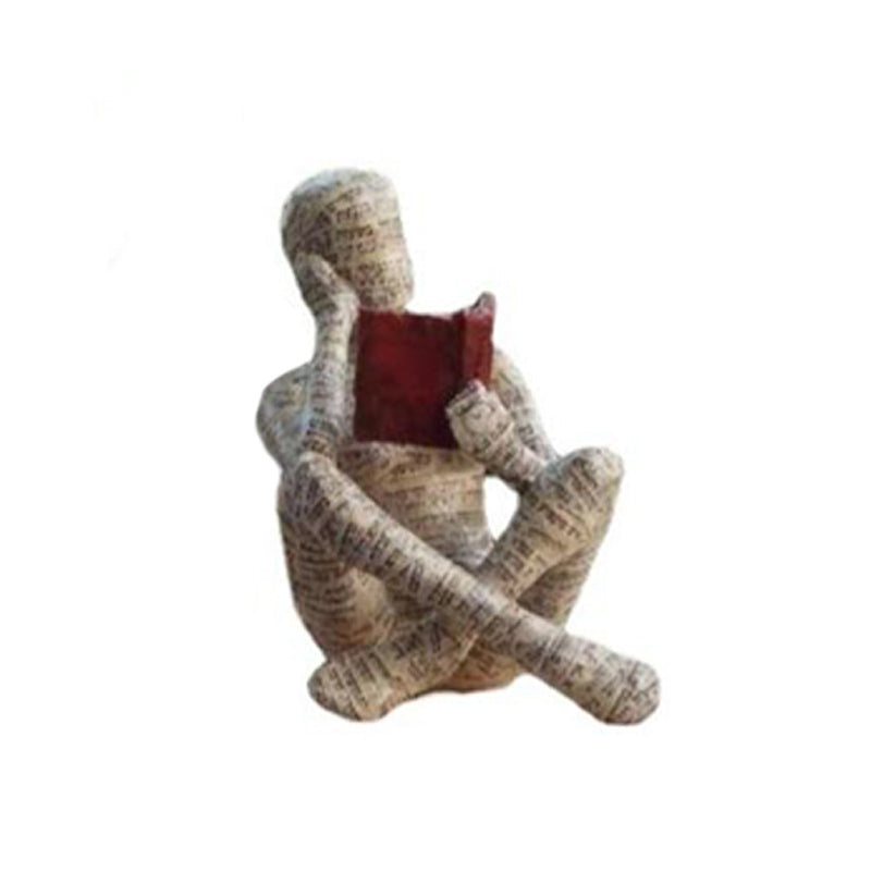 Resin Reading Statue Featuring Newspaper Print Design | ribuella