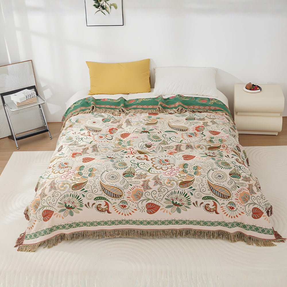 Manta reversible de estilo bohemio, vibrante estampado de hojas otoñales y bordes con borlas