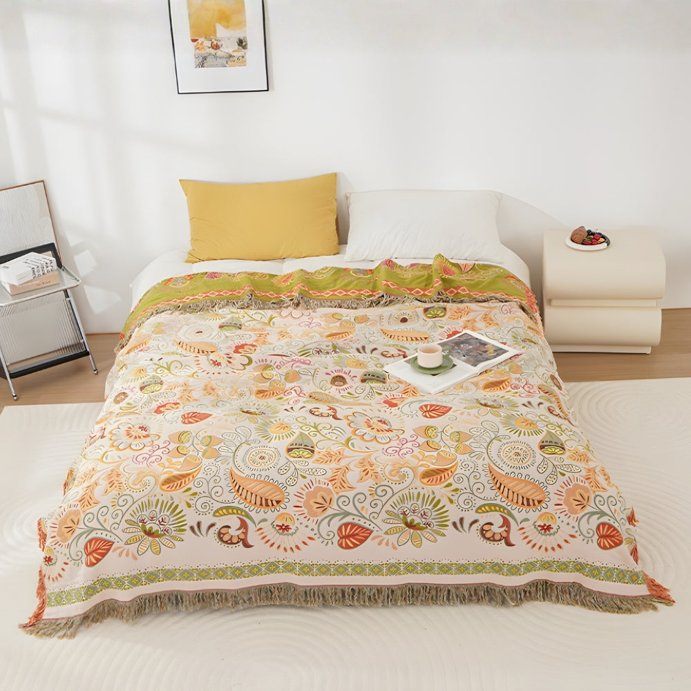 Manta reversible de estilo bohemio, vibrante estampado de hojas otoñales y bordes con borlas