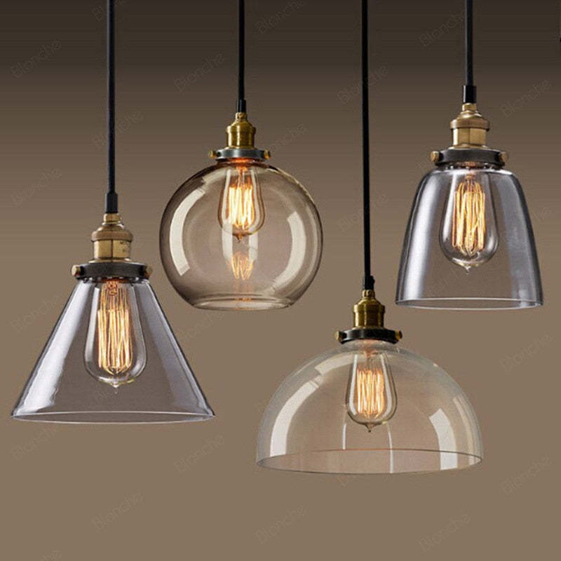 Lampada a sospensione industriale June in vetro trasparente, ambrato o grigio fumo