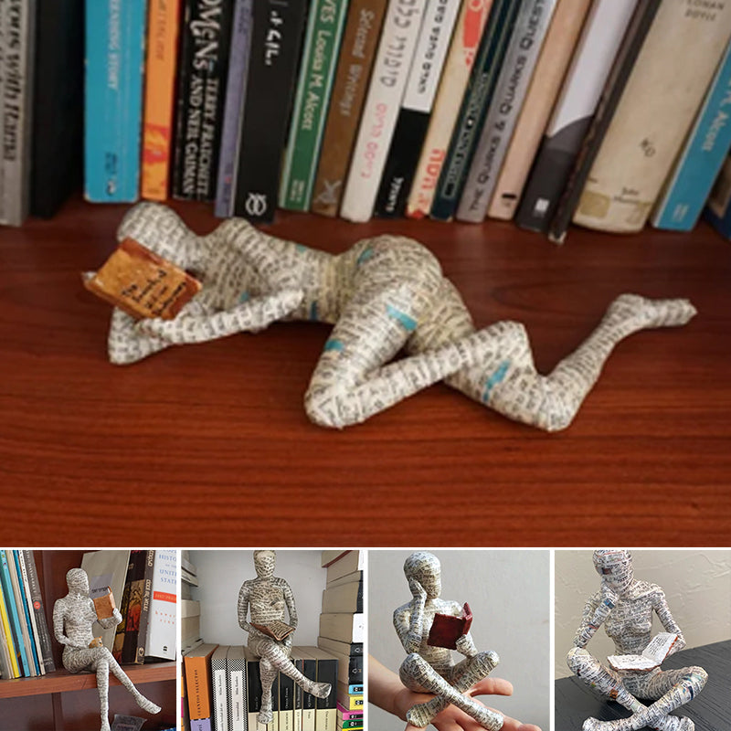 Resin Reading Statue Featuring Newspaper Print Design | ribuella