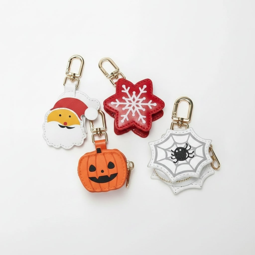 Halloween-kolikkokukkaroavaimenperä, vetoketjullinen tekonahkapussi ja avaimenpidike