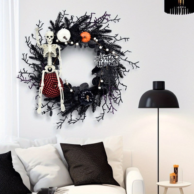 Halloween ajtókoszorú töklámpásokkal és csontváz témájú dekorációval