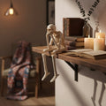 Adornos de Halloween con forma de esqueletos posables para estantería - piernas colgantes y articulaciones móviles