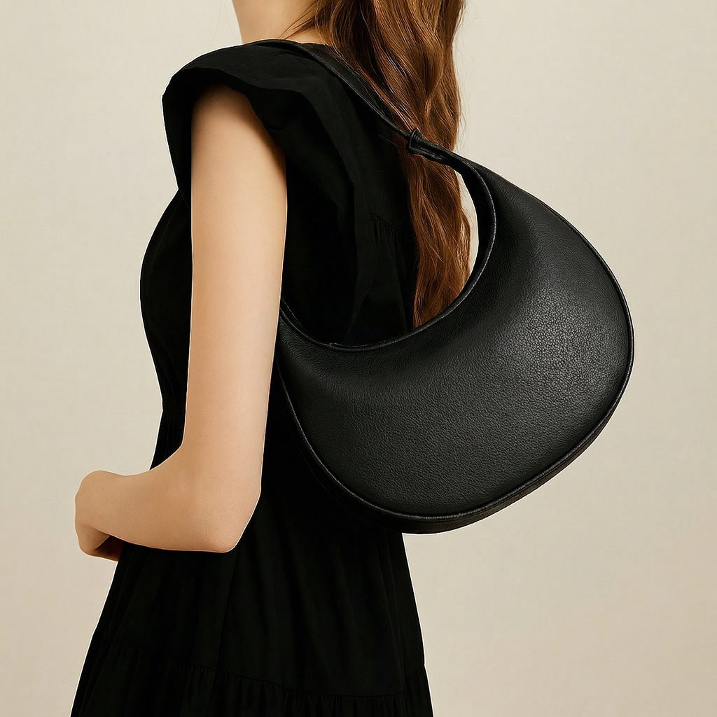 Skuldertaske i halvmåneform med alsidig 3-vejsrem | ribuella