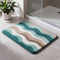 Tapis de bain moderne à motif de vagues côtières, antidérapant, doux et absorbant, en matériau floqué pour la sécurité dans la salle de bains | ribuella