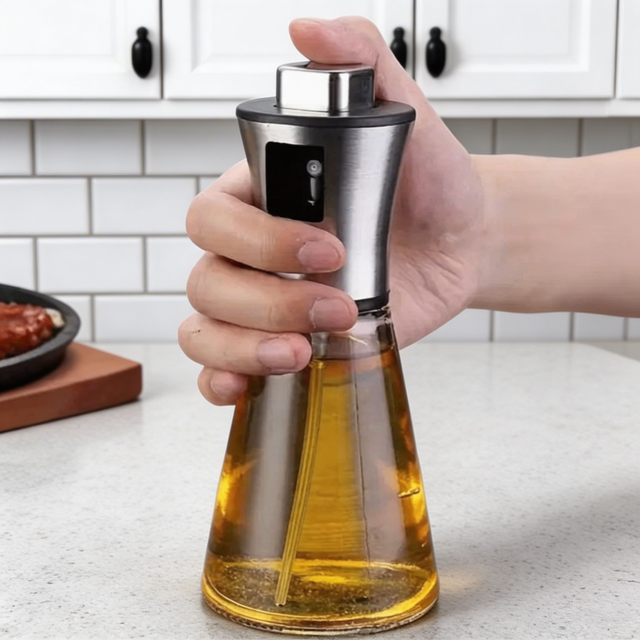 Modern Stainless Steel Olive Oil Spray Bottle with Fine Mist Nozzle for Precise Oil Application | ribuella