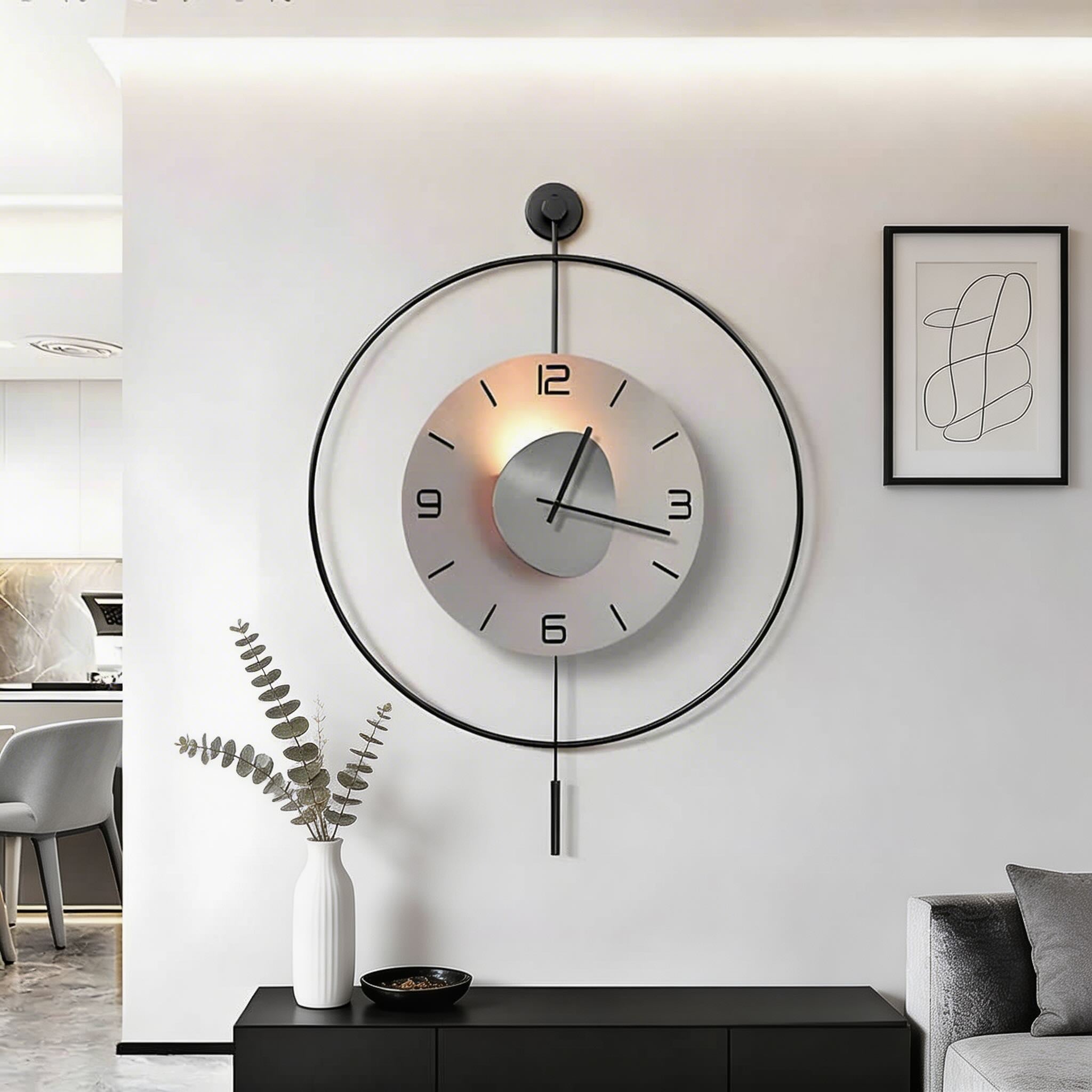 Horloge murale moderne ronde en aluminium noir avec rétroéclairage LED dissimulé, à piles | ribuella