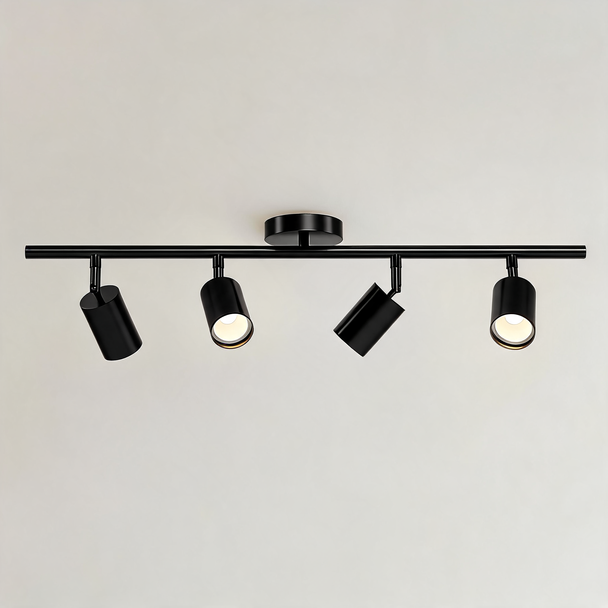 Moderne höhenverstellbare Deckenleuchte zur Aufbaumontage aus Metall mit individuell einstellbaren Spotlights | ribuella