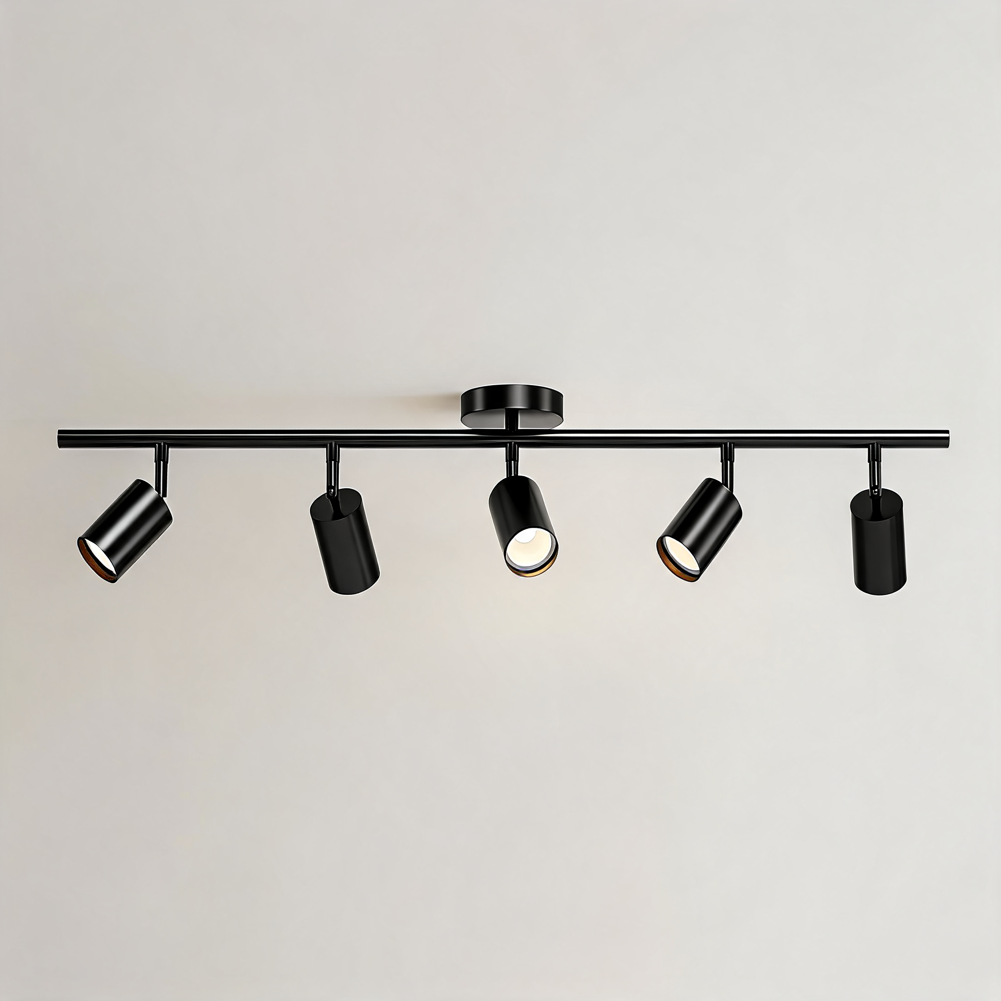 Moderne höhenverstellbare Deckenleuchte zur Aufbaumontage aus Metall mit individuell einstellbaren Spotlights | ribuella