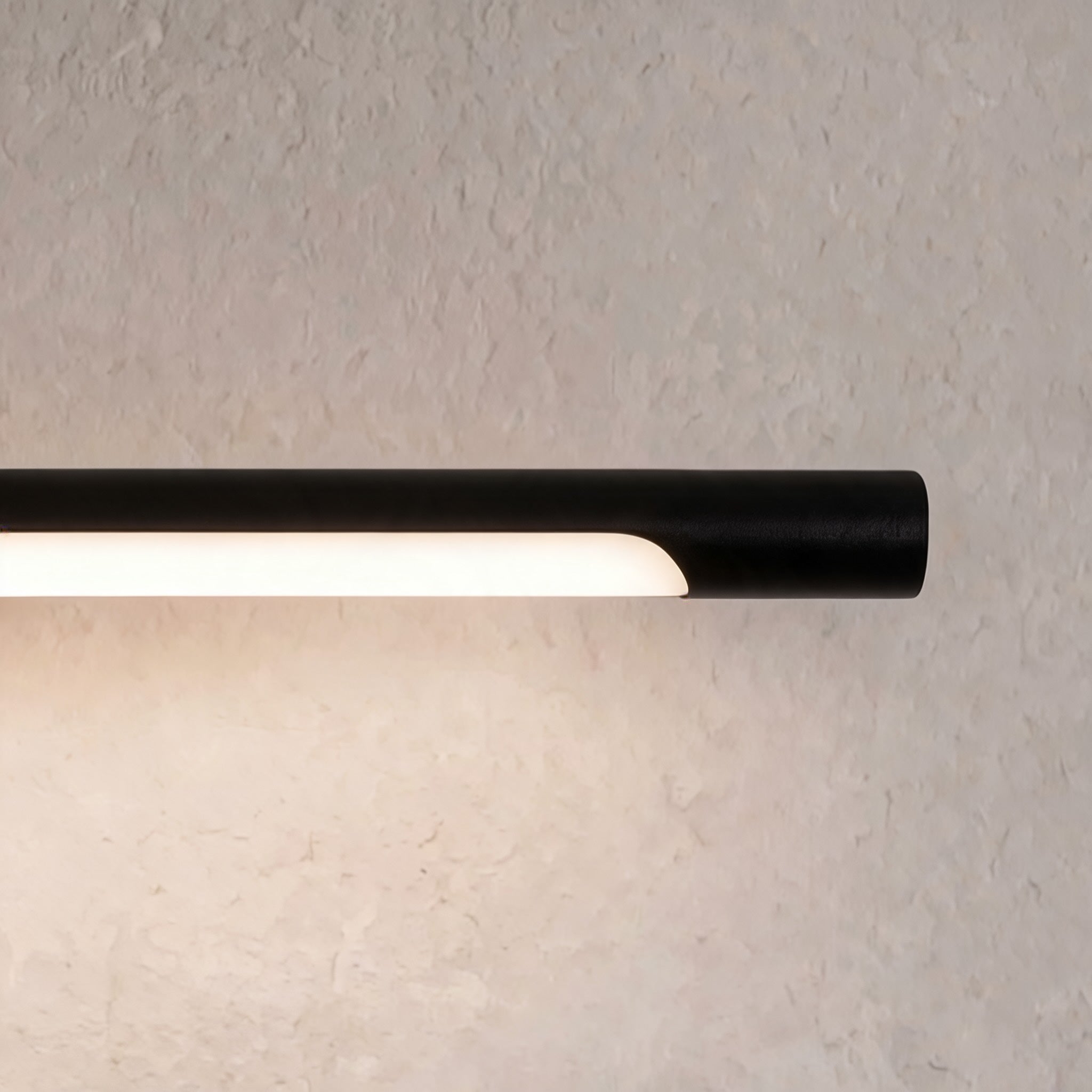 Barre lumineuse moderne pour meuble de salle de bains, fixation murale, structure noire en acrylique avec LED pour un éclairage doux | ribuella