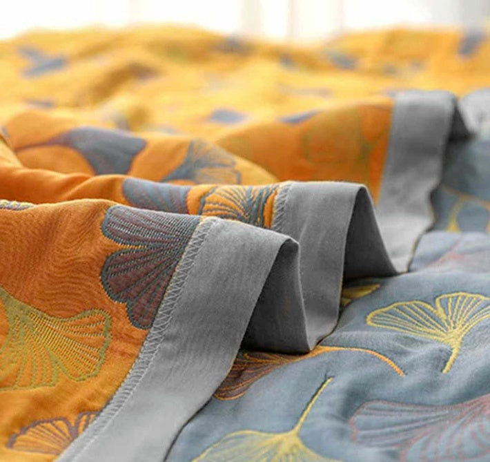 Manta reversible con estampado de hojas de ginkgo - motivo botánico de dos caras