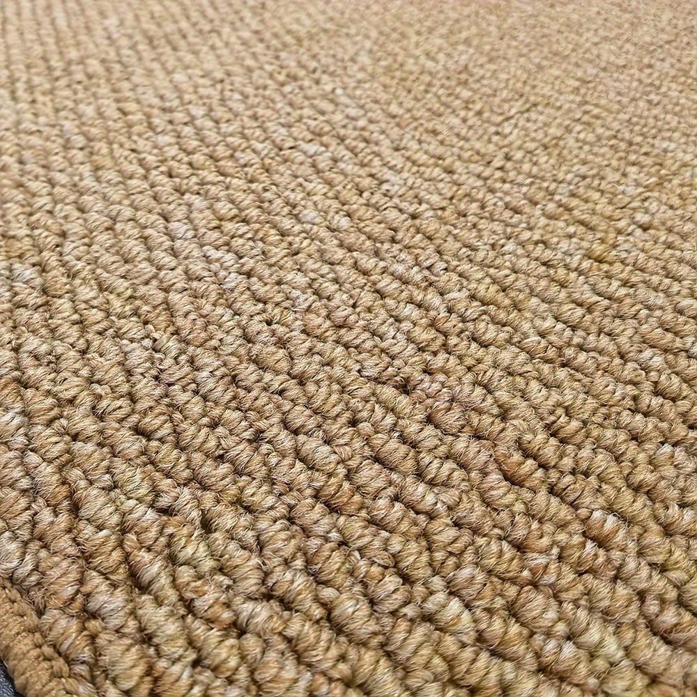 Felpudo de pelo rizado grueso, textura tejida absorbente y base antideslizante