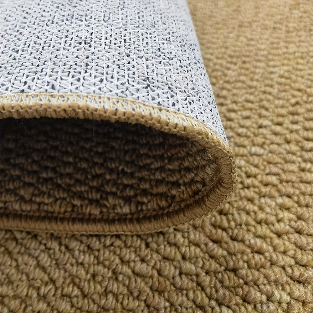Felpudo de pelo rizado grueso, textura tejida absorbente y base antideslizante