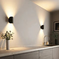 Moderne LED-vegglampe med oppover- og nedoverrettet stemningsbelysning