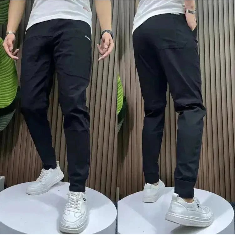 Calças jogger masculinas de corte afunilado - corte justo, tecido elástico leve, bolsos laterais
