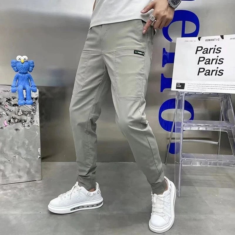 Calças jogger masculinas de corte afunilado - corte justo, tecido elástico leve, bolsos laterais